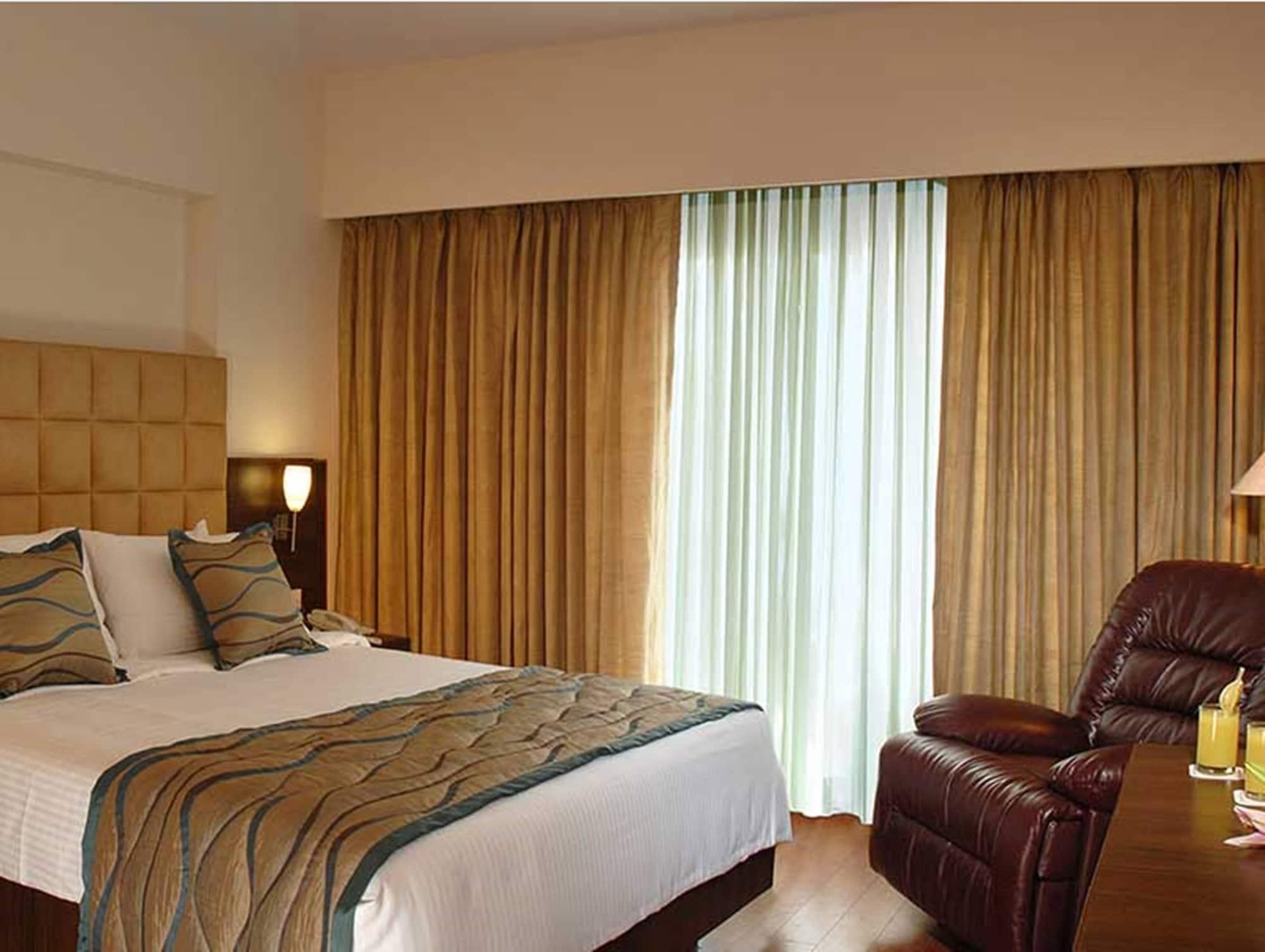 Trinity Hotel Bengaluru Extérieur photo