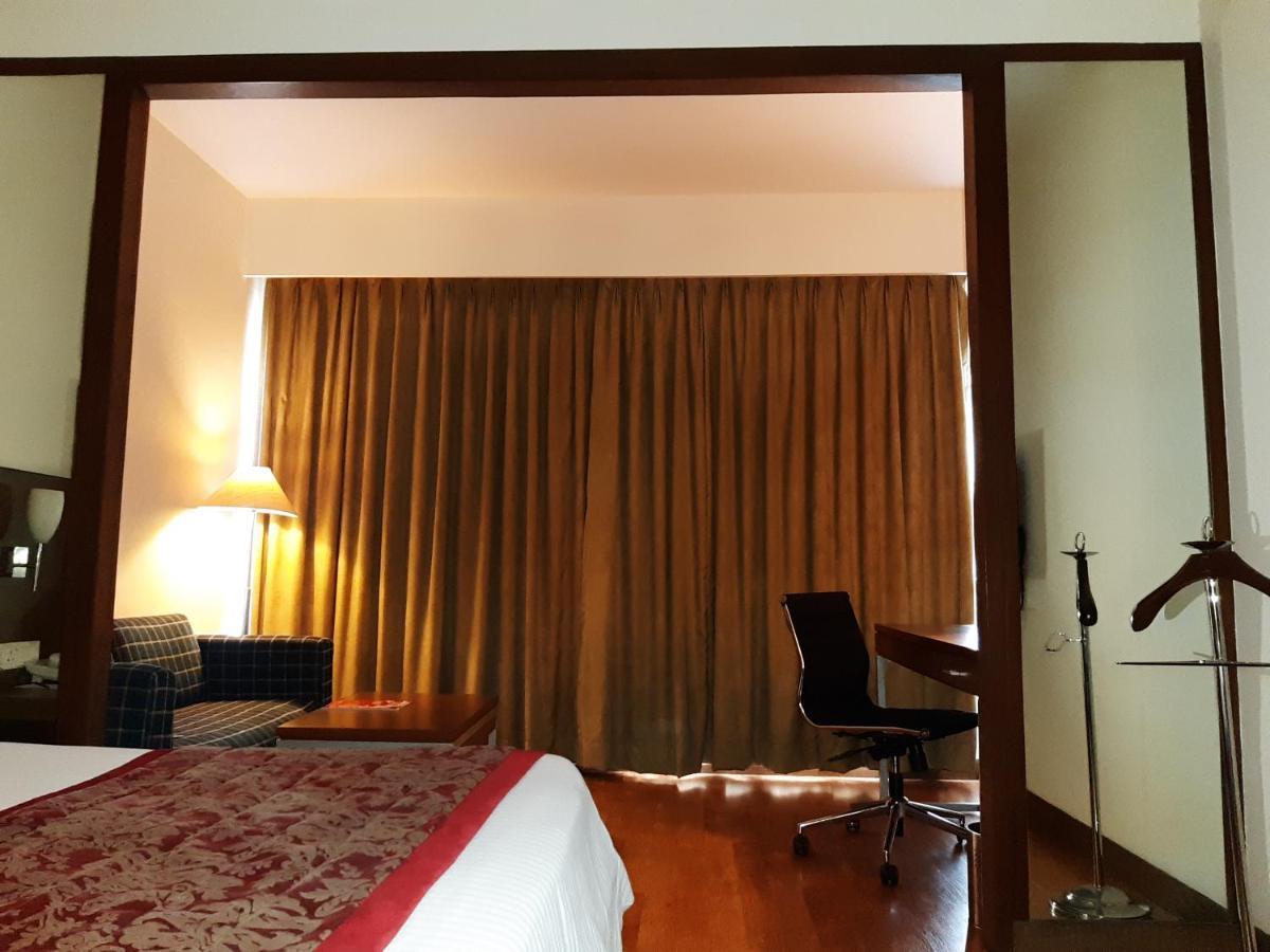 Trinity Hotel Bengaluru Extérieur photo